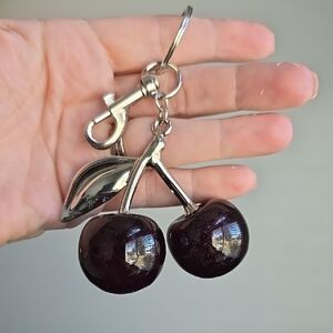 Elegant Cherry Bag Charm with Silver Accents